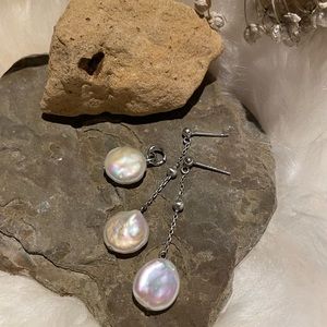 Sterling silver fresh water pearl earrings and pendant.